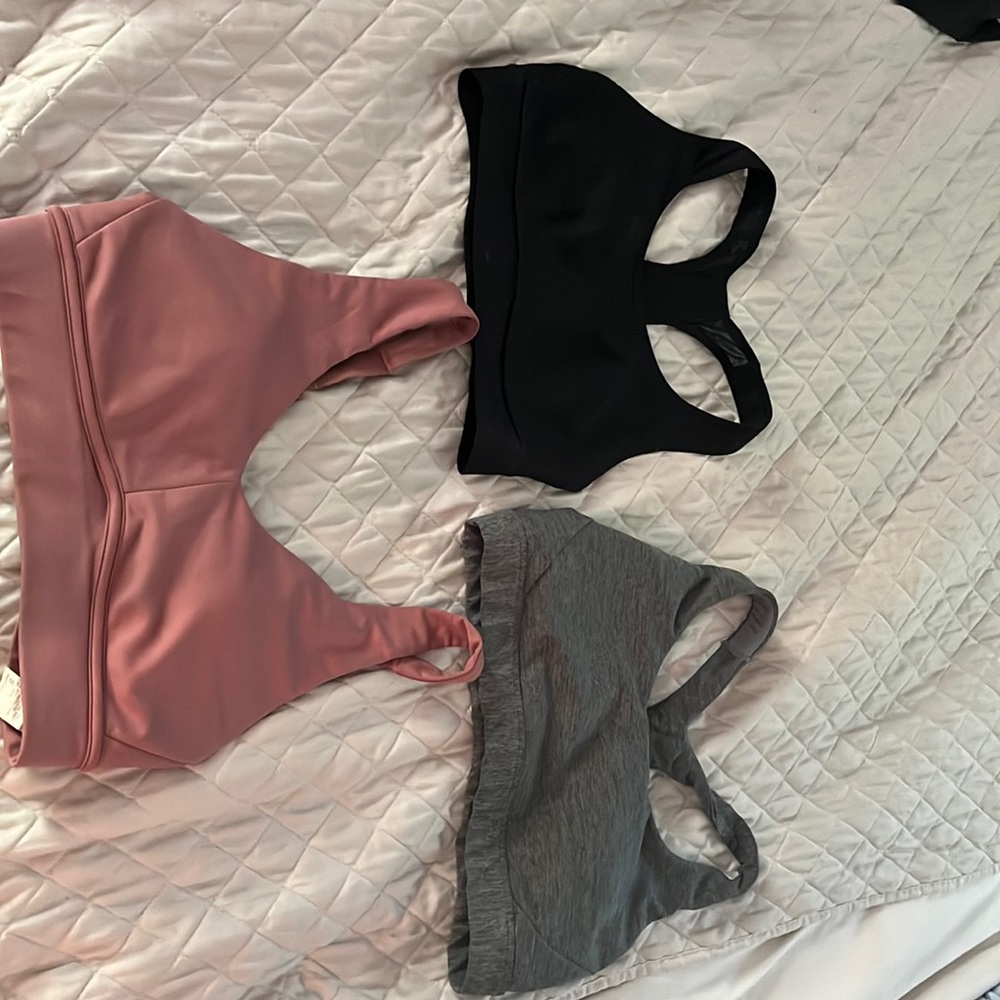 Selling 3 padded sports bras for $30 total.